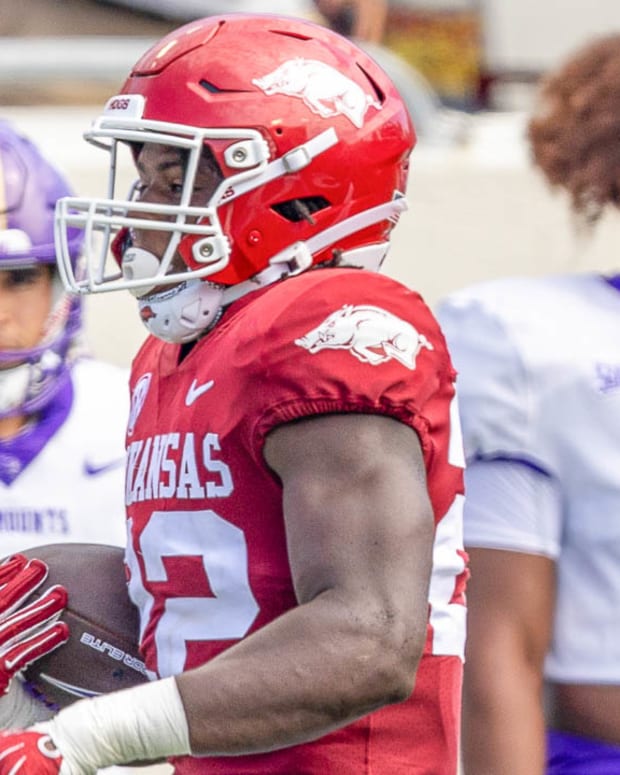 Razorbacks linebacker Brad Spence returning an interceptions for a score in opener against Western Carolina